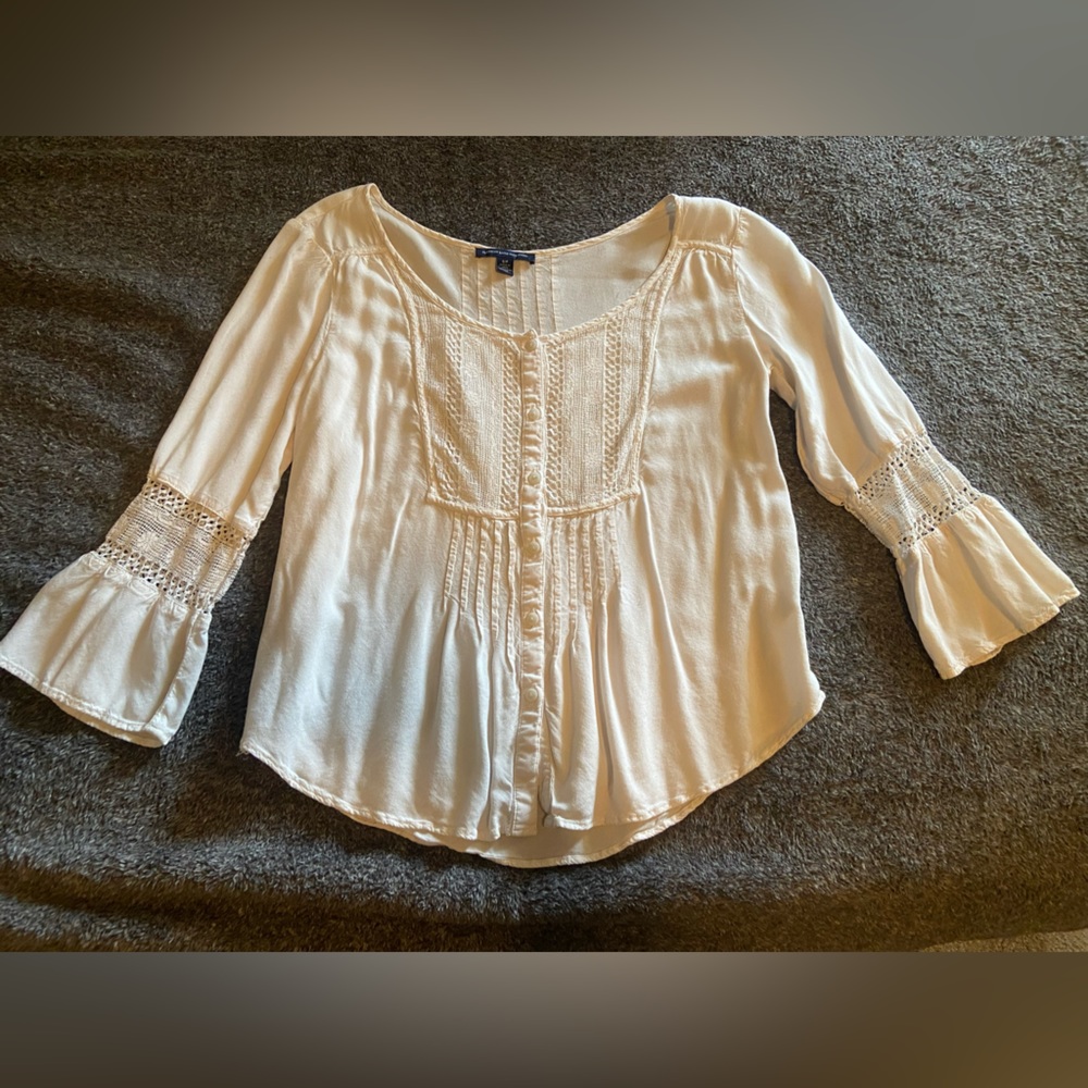 Peasant top with lace detailing. Size small, lightly worn.